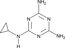 A triazine insecticide; completely inhibits larval development of the Australian sheep blow fly (0.5 ppm in rearing medium); reduces egg production by adult blow flies and subsequent larval development (1-20 μg/ml in drinking water); reduces proliferation of the house fly in chicken manure